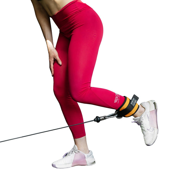 Orange Adjustable Ankle Straps for Cable Machines in use - Warm Body Cold Mind
