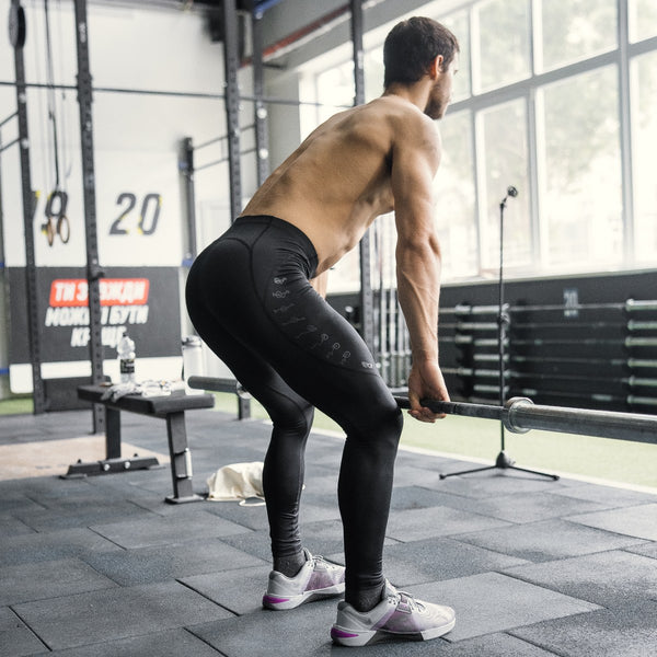 Man in Compression Pants X-Edition in a gym setting - Warm Body Cold Mind