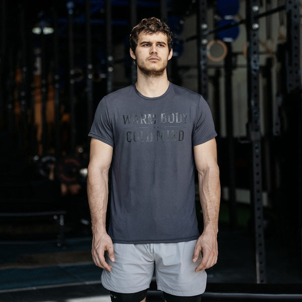 Man wearing a gray Soft Stretch Cotton T-Shirt - Warm Body Cold Mind