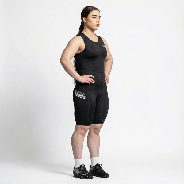 Person wearing a WOMEN'S WEIGHTLIFTING COMPRESSION SINGLET S-4 on a white background  - Warm Body Cold Mind